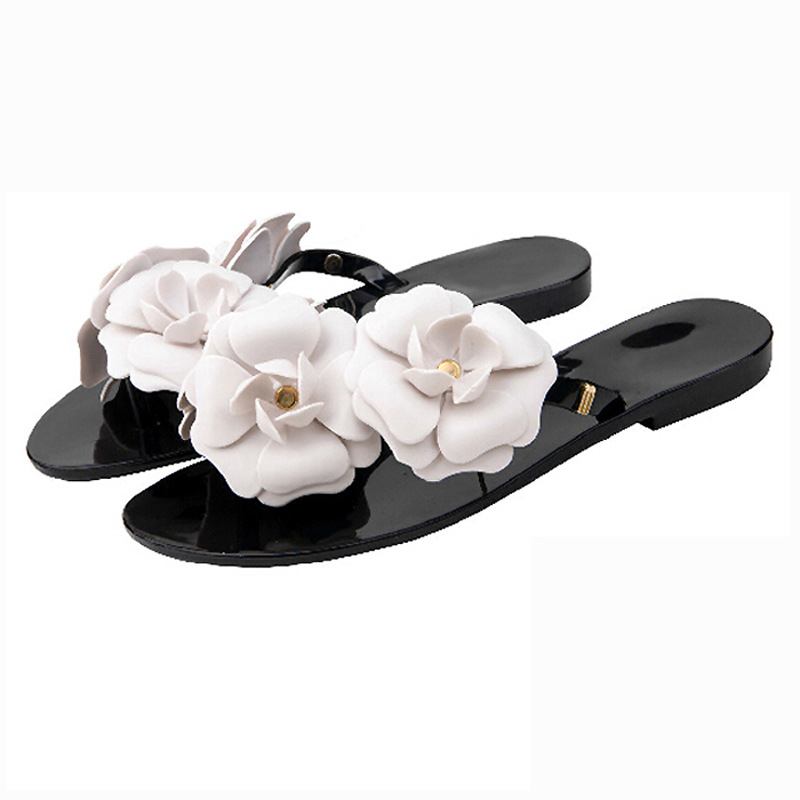 Uudet Summer Camellia Tossut Tasapohjaiset Jelly Flip Flops Naisten Liukumattomat Pieni Tuoksu Kukka Rantasandaalit Tohvelit